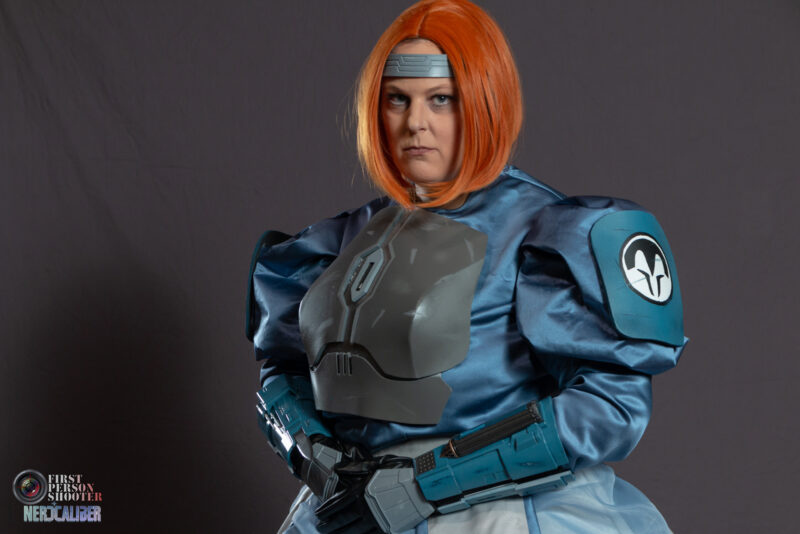 A landscape-oriented portrait of a cosplayer dressed as a ball gown version of the Star Wars character Bo-Katan Kryze.